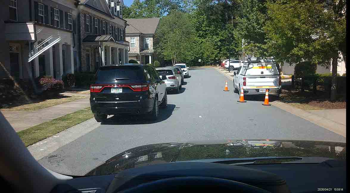 Matthew Kufeld? Jessica Schmitz? Tyler Bugbee? Where are you? Aren't y'all supposed to get these illegally parked cars off the street?